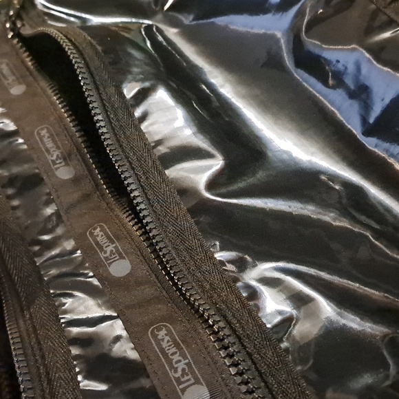 LeSportsac Deluxe Everyday Bag in a black shine or patent finish. - Picture 12 of 13